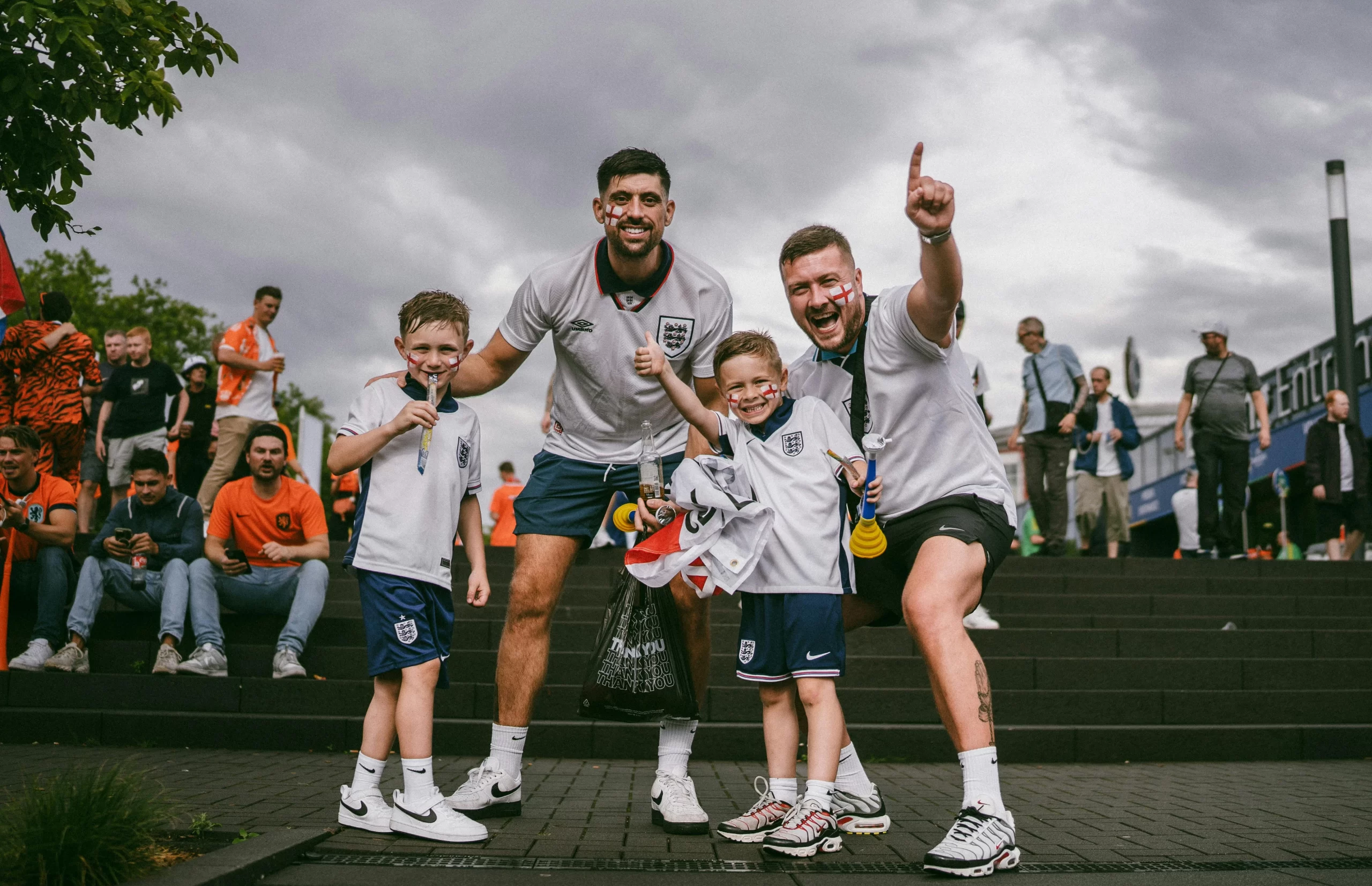 Parent and child taking a picture before a sports event.