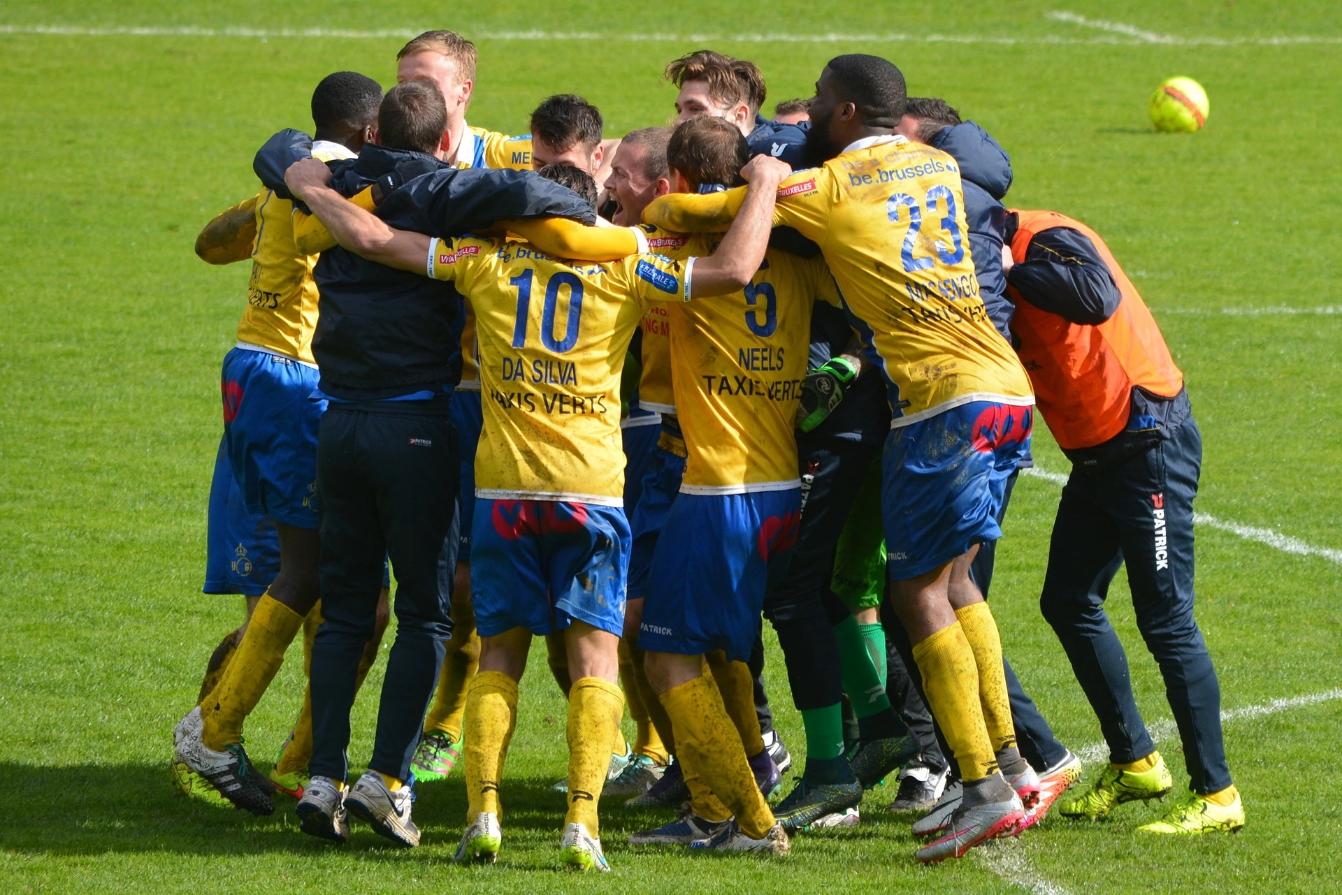 A team of young male soccer athletes who won the game.